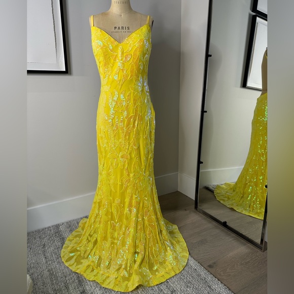 JoVani Yellow Dress
The Jovani 07784A Yellow Pattern Sequin Embellished Gown - Picture 1 of 7